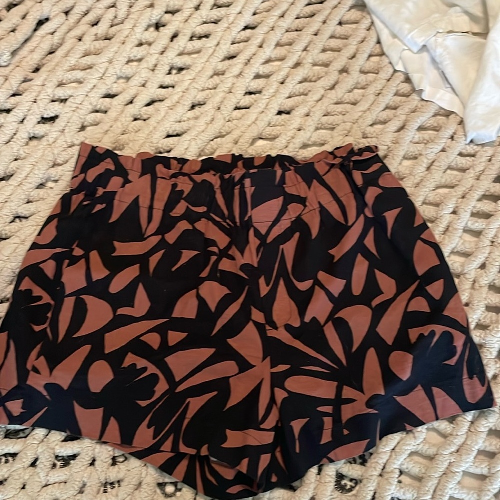 a. new. day. Paper bag shorts